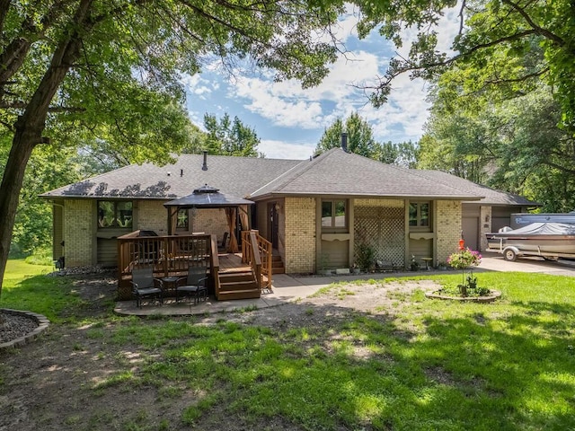 18241 Dahlia St NW, Oak Grove, MN 55011 - view of front of property featuring a gazebo, brick siding, and an attached garage