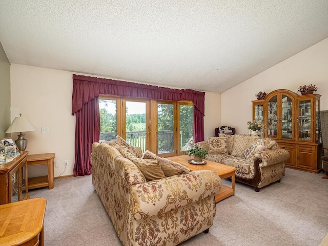 18241 Dahlia St NW, Oak Grove, MN 55011 - living room with light colored carpet, a textured ceiling, and lofted ceiling