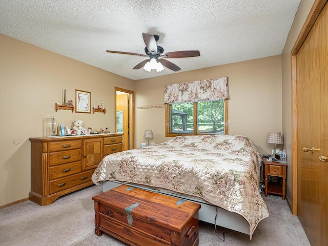 18241 Dahlia St NW, Oak Grove, MN 55011 - bedroom featuring light colored carpet, a textured ceiling, ceiling fan, and a closet