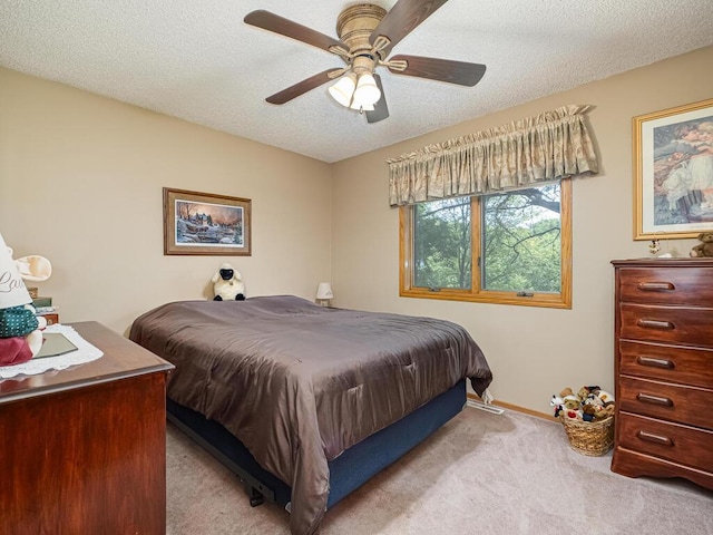 18241 Dahlia St NW, Oak Grove, MN 55011 - bedroom featuring carpet, a textured ceiling, and ceiling fan