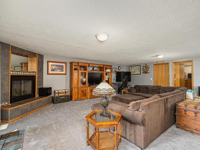 18241 Dahlia St NW, Oak Grove, MN 55011 - carpeted living room with a fireplace and a textured ceiling