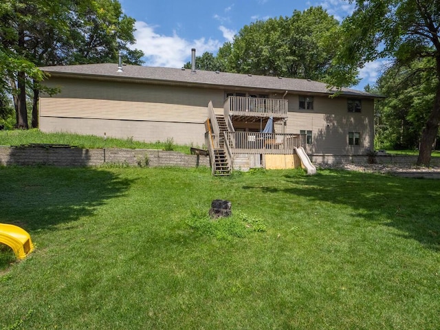 18241 Dahlia St NW, Oak Grove, MN 55011 - rear view of property with stairway, a wooden deck, and a yard
