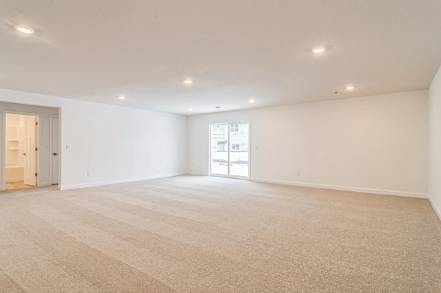 20119 68th Pl, Corcoran, MN 55340 - unfurnished room featuring light carpet and recessed lighting
