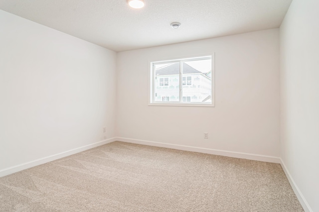 20119 68th Pl, Corcoran, MN 55340 - empty room featuring light colored carpet and baseboards
