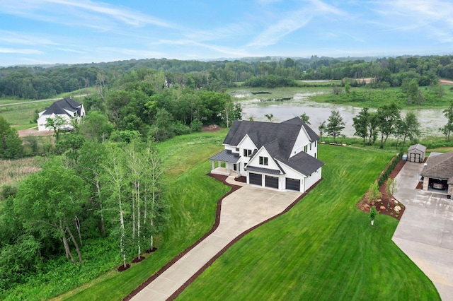 9743 Frontier Ln, Lakeville, MN 55044 - aerial view of property and surrounding area with a nearby body of water and a heavily wooded area