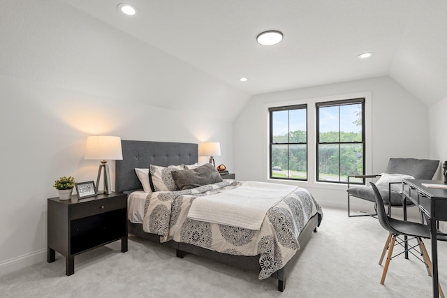 9743 Frontier Ln, Lakeville, MN 55044 - bedroom featuring vaulted ceiling, light colored carpet, and recessed lighting