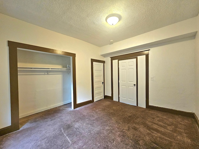 324 Holcombe Ave, Litchfield, MN 55355 - unfurnished bedroom with carpet flooring, a textured ceiling, and a closet