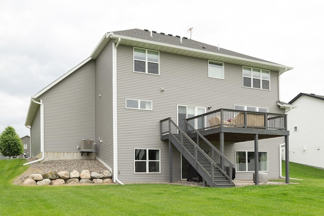 1149 167th Ave NW, Andover, MN 55304 - back of house featuring a wooden deck, stairs, and a lawn