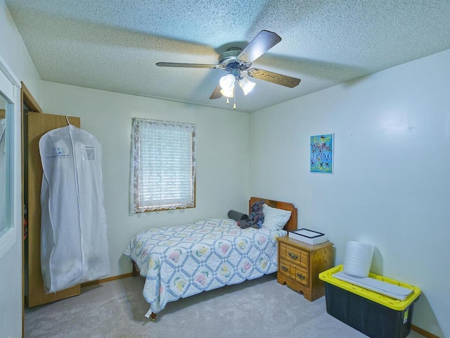 638 Shady Creek Cir, Winsted, MN 55395 - bedroom with carpet flooring, a ceiling fan, and a textured ceiling