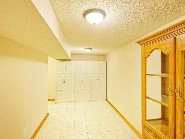638 Shady Creek Cir, Winsted, MN 55395 - hall featuring a textured ceiling and light tile patterned floors