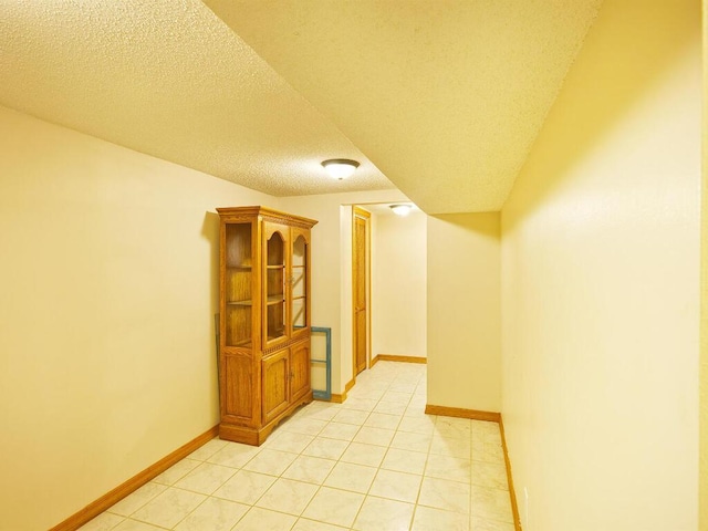 638 Shady Creek Cir, Winsted, MN 55395 - unfurnished room with a textured ceiling and light tile patterned floors