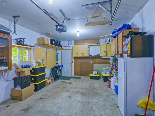 638 Shady Creek Cir, Winsted, MN 55395 - garage featuring a garage door opener