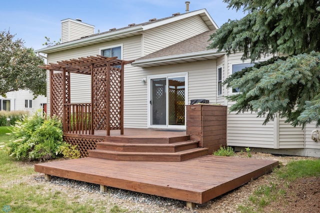 3306 26th Ave S, Fargo, ND 58103 - back of house with a pergola, a wooden deck, and a chimney