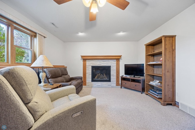 3306 26th Ave S, Fargo, ND 58103 - living room with ceiling fan, carpet flooring, and a stone fireplace