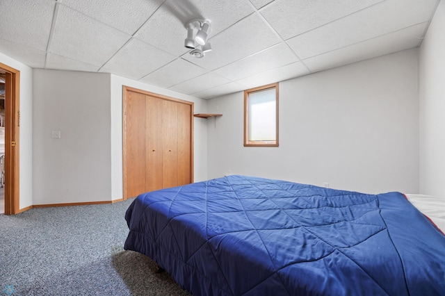 3306 26th Ave S, Fargo, ND 58103 - bedroom featuring carpet floors, a paneled ceiling, and a closet
