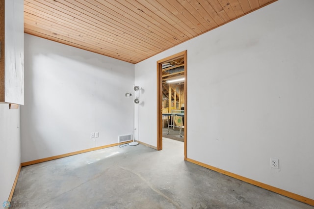 3306 26th Ave S, Fargo, ND 58103 - spare room with wood ceiling and concrete floors