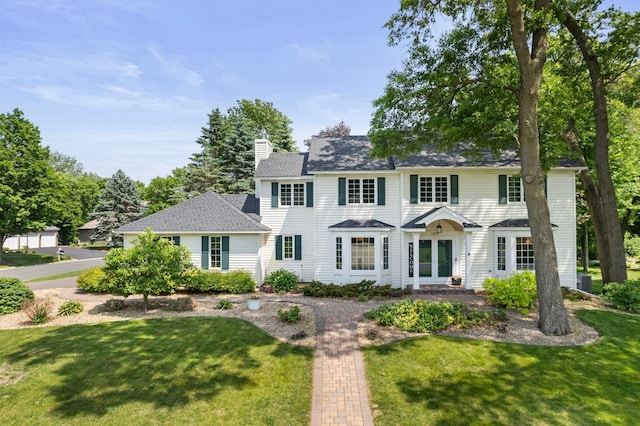 13870 Daphne Ln, Rosemount, MN 55068 - colonial home with a front lawn, a chimney, and roof with shingles