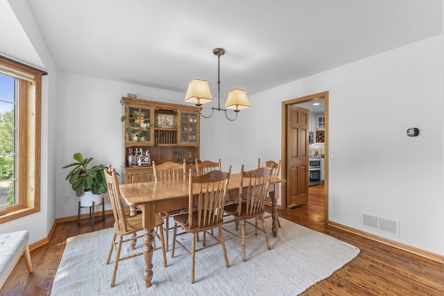 13870 Daphne Ln, Rosemount, MN 55068 - dining space featuring wood finished floors and baseboards