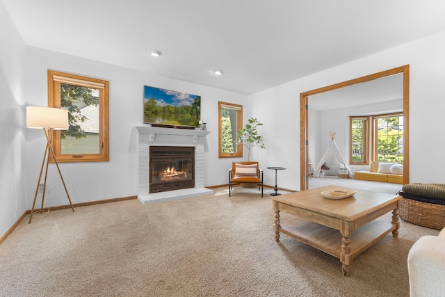 13870 Daphne Ln, Rosemount, MN 55068 - living area featuring a brick fireplace, plenty of natural light, carpet floors, baseboards, and recessed lighting