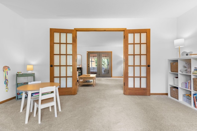 13870 Daphne Ln, Rosemount, MN 55068 - game room with french doors, carpet flooring, and baseboards