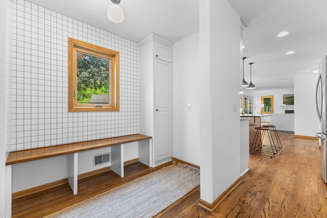 13870 Daphne Ln, Rosemount, MN 55068 - mudroom featuring wood finished floors, baseboards, recessed lighting, and built in desk