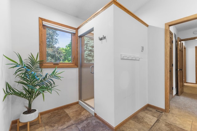 13870 Daphne Ln, Rosemount, MN 55068 - corridor featuring baseboards and stone finish floors