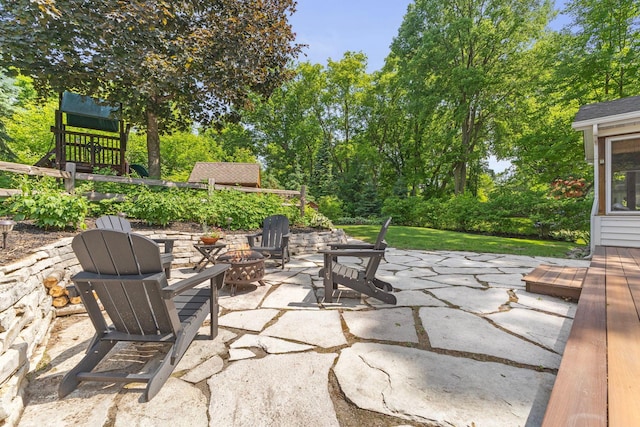 13870 Daphne Ln, Rosemount, MN 55068 - view of patio / terrace featuring an outdoor fire pit