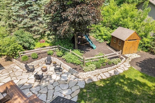 13870 Daphne Ln, Rosemount, MN 55068 - view of patio with a fire pit and a playground