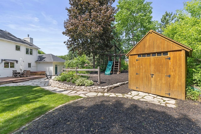13870 Daphne Ln, Rosemount, MN 55068 - view of grassy yard with a playground and a patio area