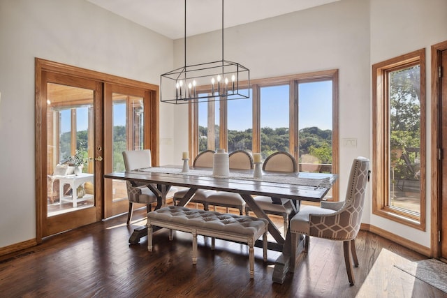 10481 Bluff Rd, Eden Prairie, MN 55347 - dining area with a chandelier, dark wood finished floors, and french doors