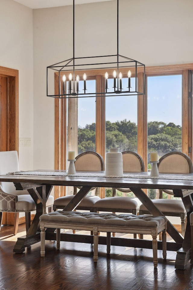 10481 Bluff Rd, Eden Prairie, MN 55347 - dining space with a chandelier, healthy amount of natural light, and wood finished floors