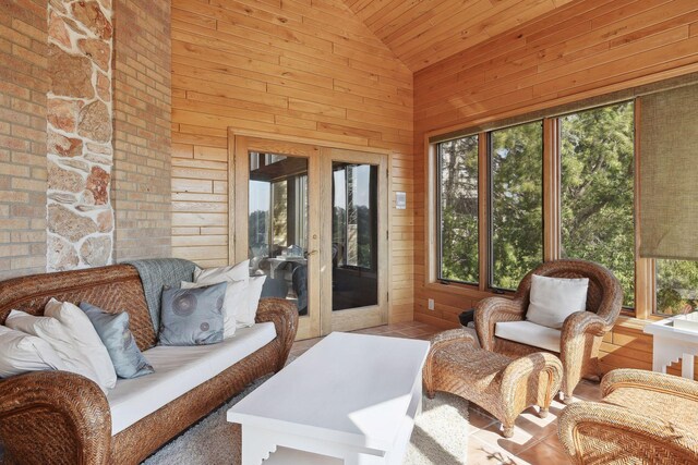 10481 Bluff Rd, Eden Prairie, MN 55347 - sunroom with lofted ceiling, wooden ceiling, wooden walls, french doors, and tile patterned floors