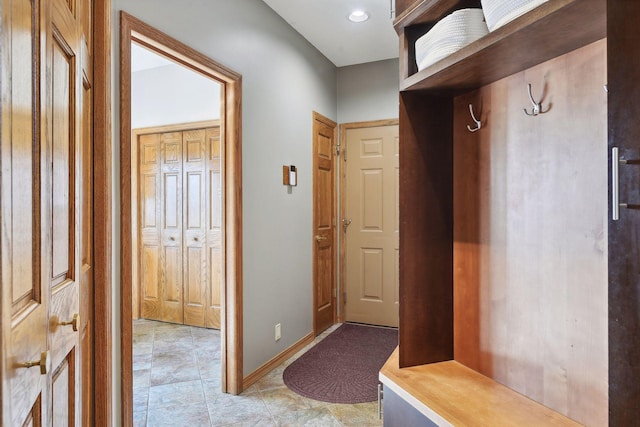 10481 Bluff Rd, Eden Prairie, MN 55347 - mudroom featuring baseboards