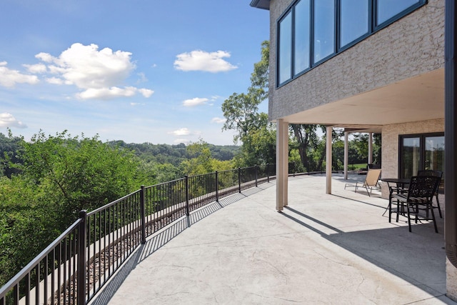 10481 Bluff Rd, Eden Prairie, MN 55347 - patio / terrace with a forest view