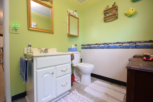 3777 Deer Lake Dr, Danbury, WI 54830 - bathroom featuring vanity, a wainscoted wall, and tile patterned floors