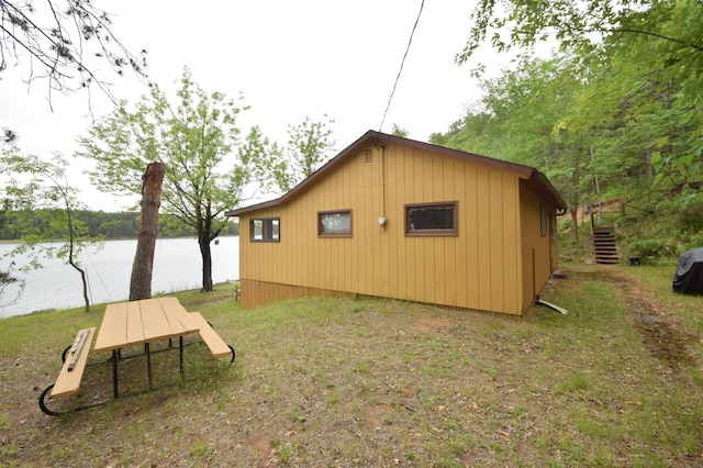 3777 Deer Lake Dr, Danbury, WI 54830 - view of side of home with a water view and stairs