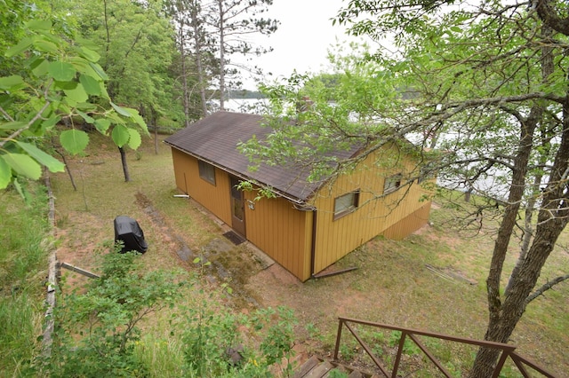 3777 Deer Lake Dr, Danbury, WI 54830 - view of side of home with a shingled roof