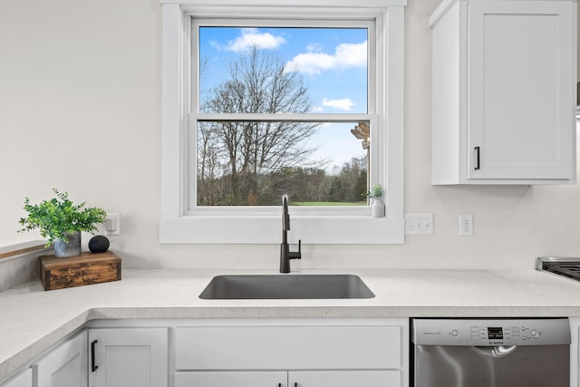 6359 313th Ave NE, North Branch, MN 55056 - kitchen featuring dishwasher, light countertops, and white cabinets