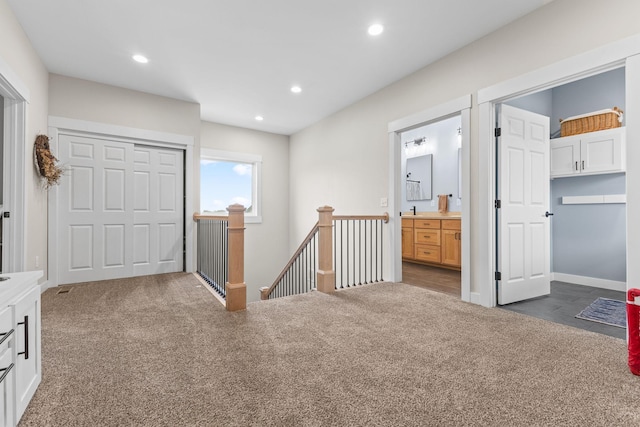 6359 313th Ave NE, North Branch, MN 55056 - corridor featuring an upstairs landing, carpet, and recessed lighting