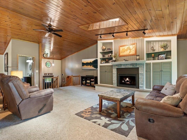 15473 Wilderness Trl, Crosslake, MN 56442 - carpeted living room with wooden ceiling, track lighting, built in shelves, a ceiling fan, and vaulted ceiling