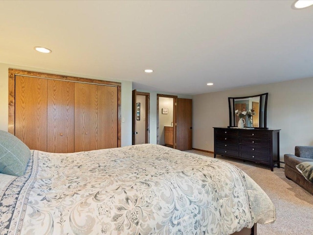 15473 Wilderness Trl, Crosslake, MN 56442 - bedroom with recessed lighting, light carpet, and a closet