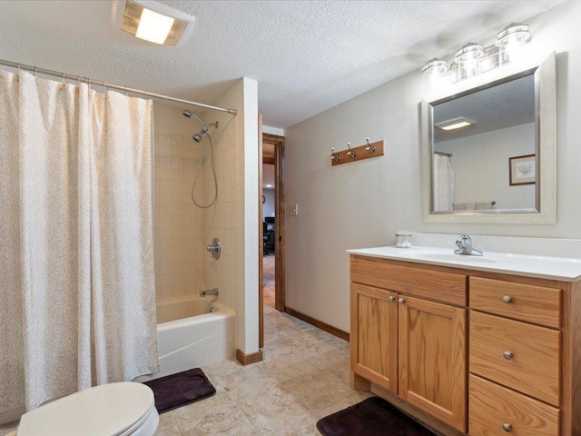 15473 Wilderness Trl, Crosslake, MN 56442 - full bathroom featuring vanity, shower / bath combo with shower curtain, a textured ceiling, and tile patterned floors