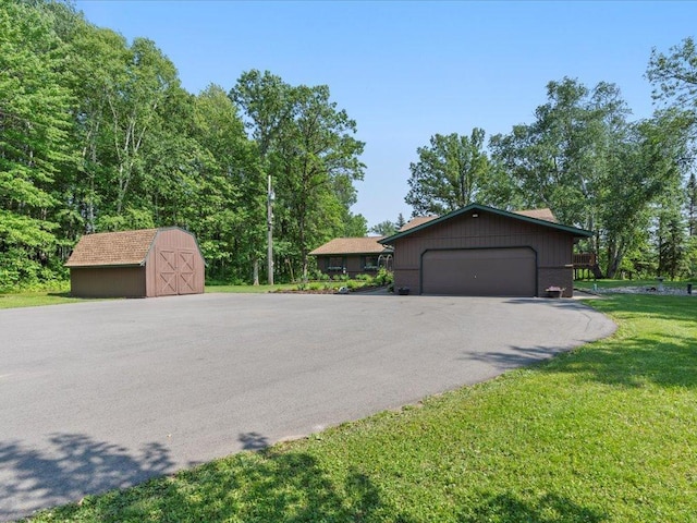 15473 Wilderness Trl, Crosslake, MN 56442 - garage featuring a shed