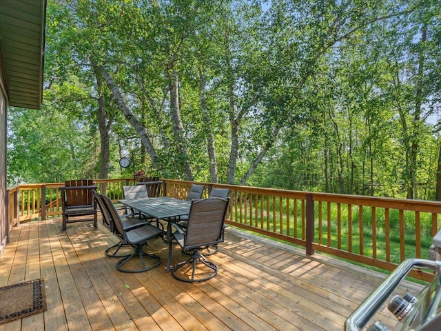 15473 Wilderness Trl, Crosslake, MN 56442 - wooden terrace featuring outdoor dining area