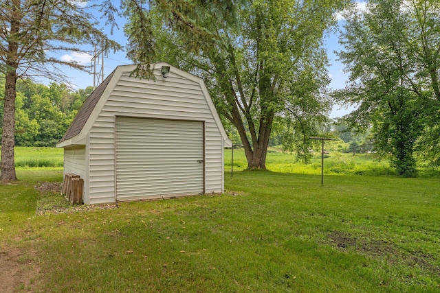 9351 Ermine Blvd NW, Ramsey, MN 55303 - view of green lawn featuring a storage unit