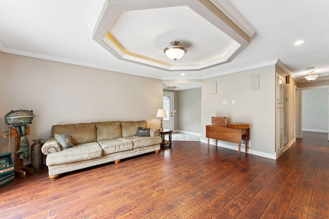 9351 Ermine Blvd NW, Ramsey, MN 55303 - living room featuring recessed lighting, crown molding, wood finished floors, and a raised ceiling