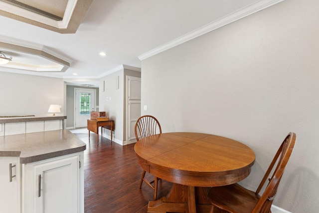 9351 Ermine Blvd NW, Ramsey, MN 55303 - dining space featuring dark wood finished floors, ornamental molding, and recessed lighting