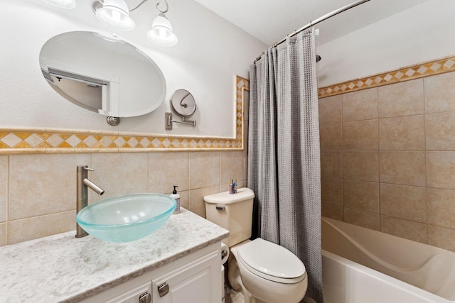 9351 Ermine Blvd NW, Ramsey, MN 55303 - bathroom with shower / tub combo, vanity, tile walls, and wainscoting