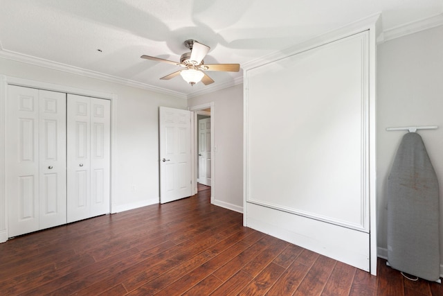 9351 Ermine Blvd NW, Ramsey, MN 55303 - unfurnished bedroom featuring wood finished floors, crown molding, a closet, and a ceiling fan