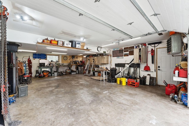 9351 Ermine Blvd NW, Ramsey, MN 55303 - garage with a heating unit and a workshop area